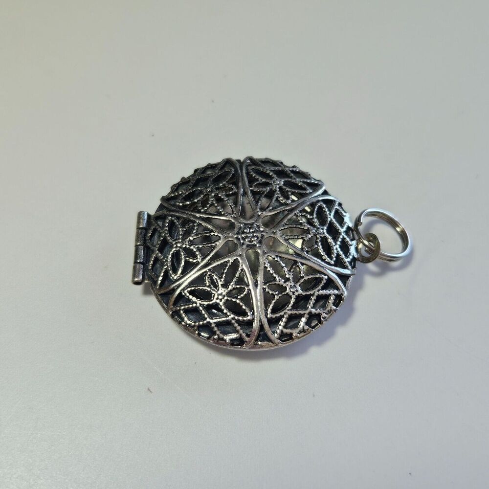 **Last Chance!! Final Sale** Silver tone round filigree locket - Picture 9 of 9